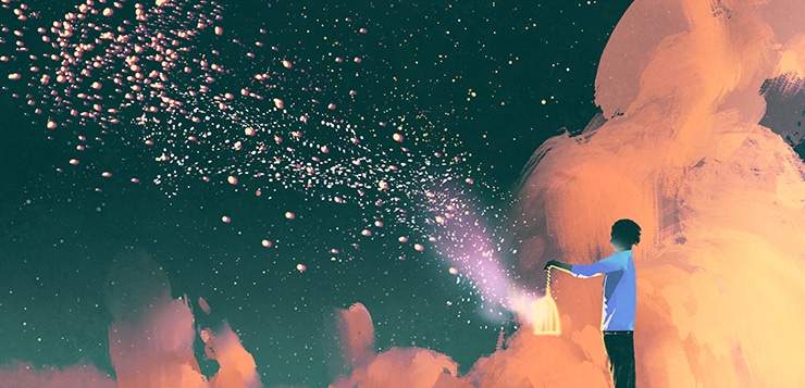 man holding sparkling lantern